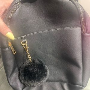 Black Pom Pom mini backpack